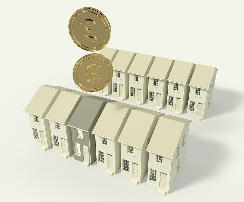 Row of houses with one highlighted in a different shade, with two coins above it
