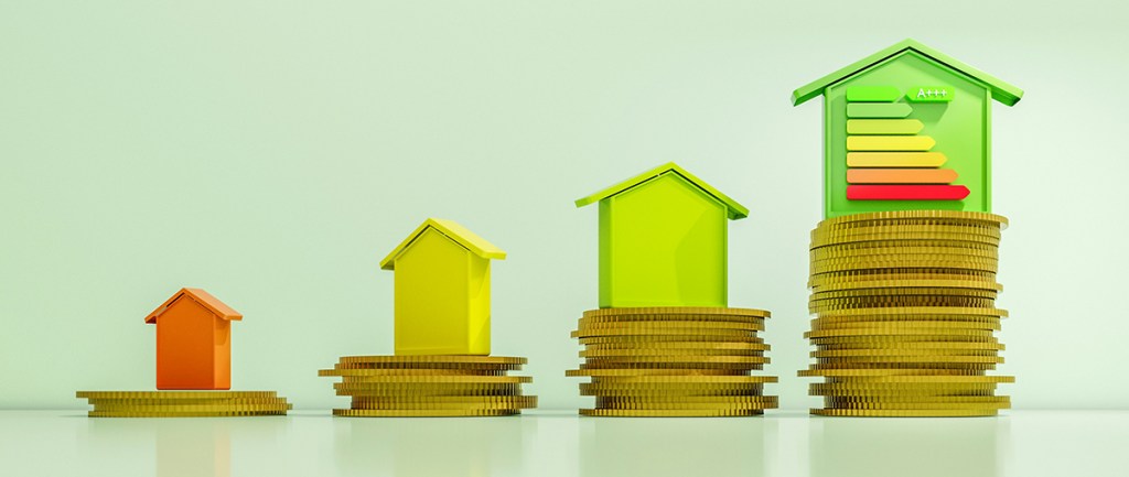 Four piles of coins each increasing in size, with a model of a house on the top of each. The right-most house has an energy rating graph on, indicating the most efficient band